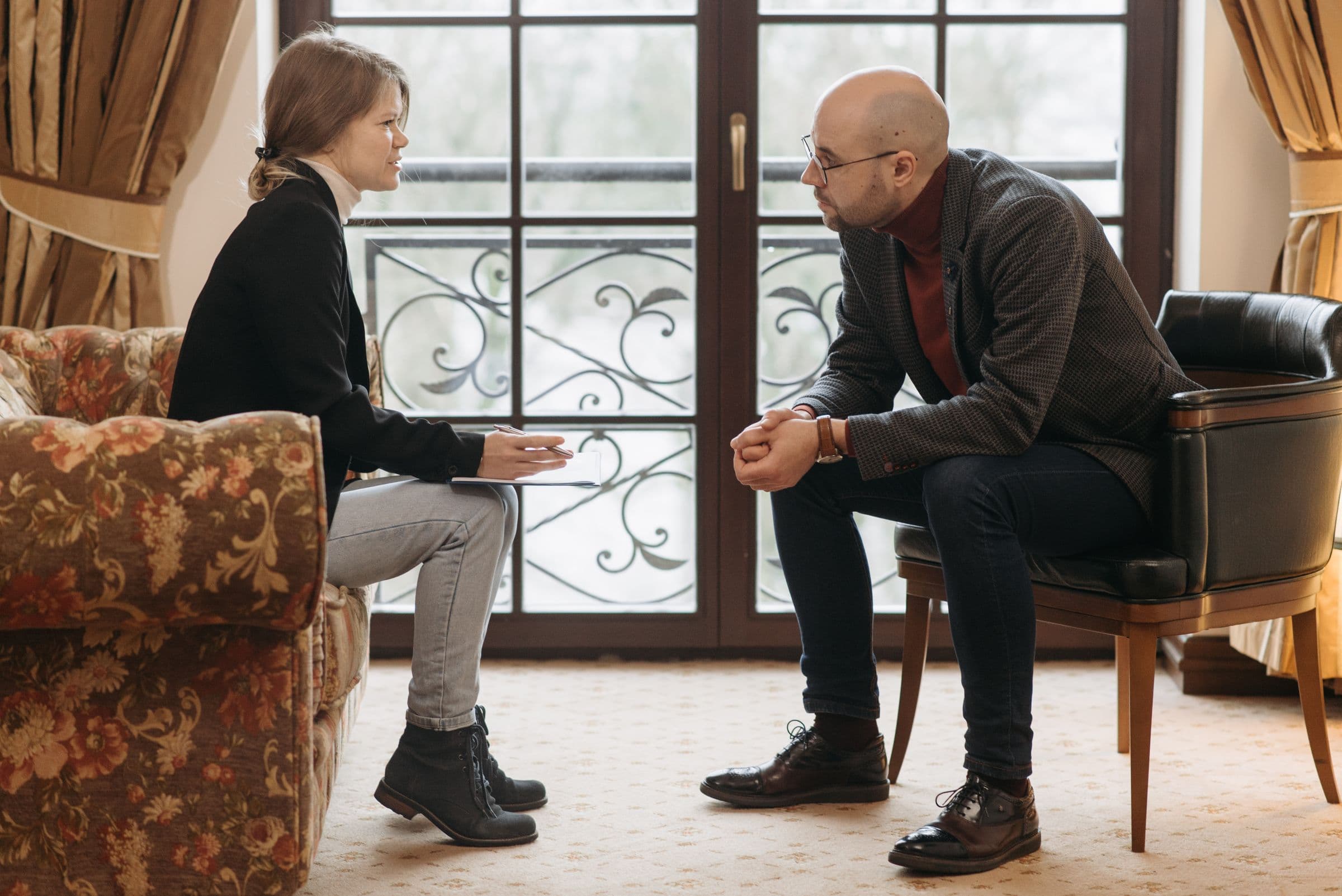 A manager and employee having a focused one-on-one conversation